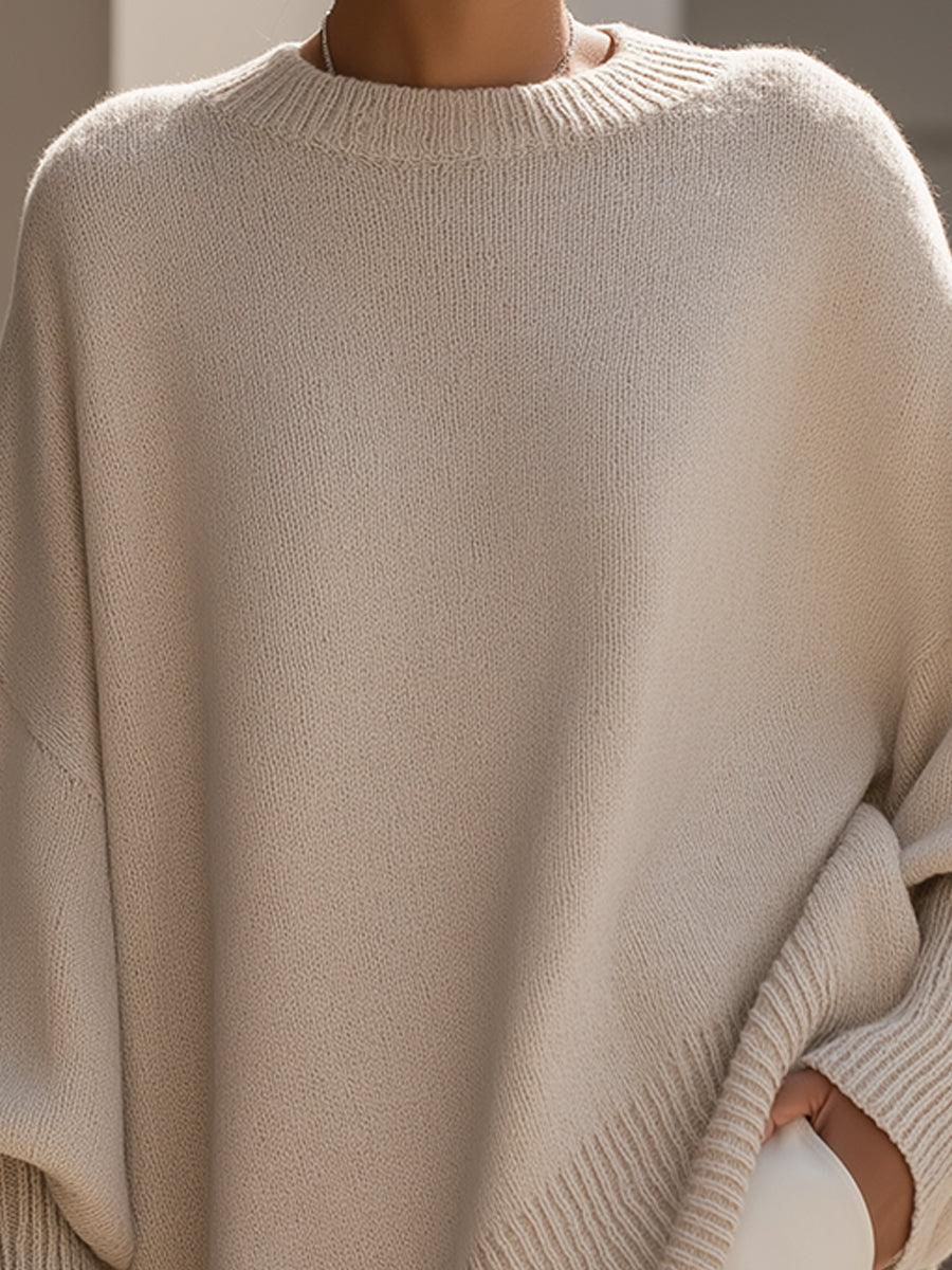 Bea - Poncho-striktrøje i elegant beige