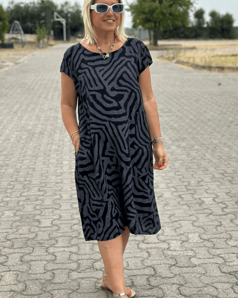 Nelia - Sommerkjole med rund hals og smukt print