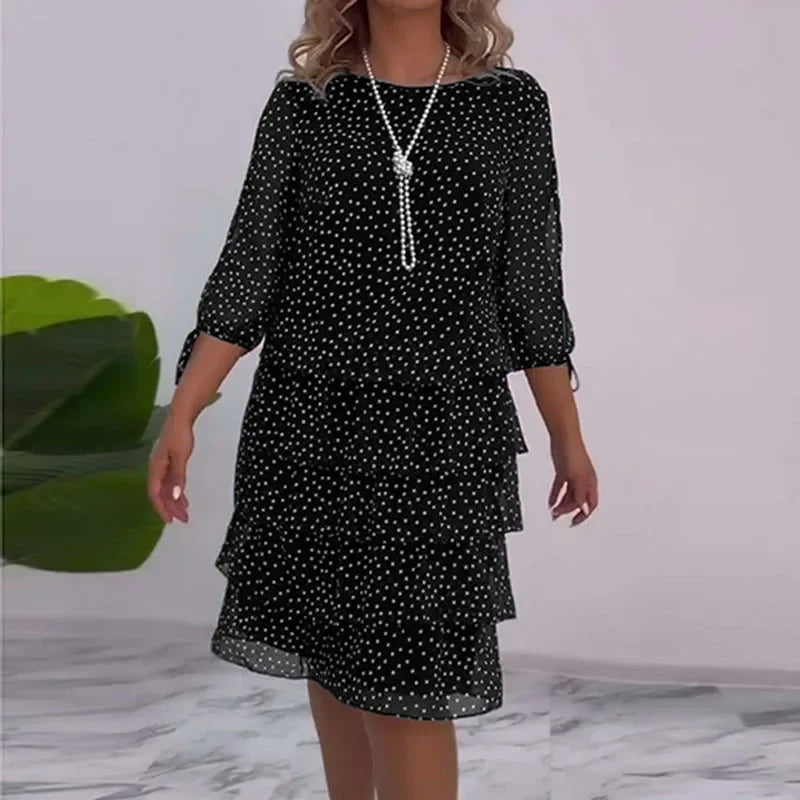 Ella - Elegant midikjole med prikker