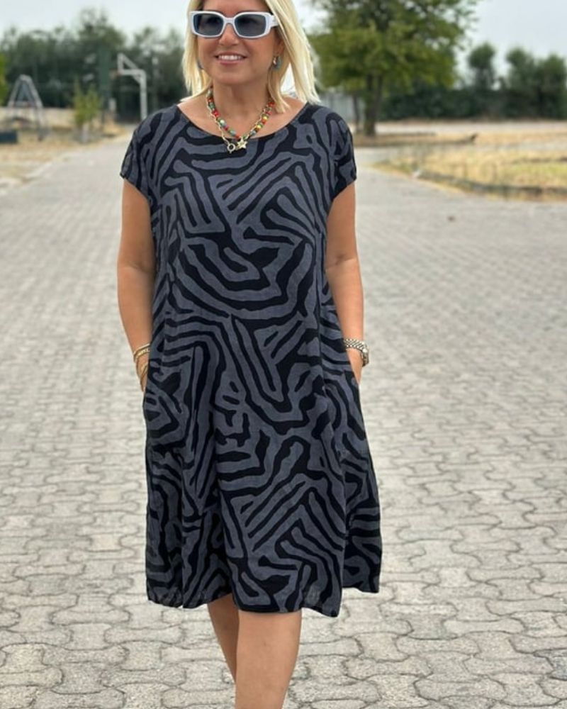Nelia - Sommerkjole med rund hals og smukt print