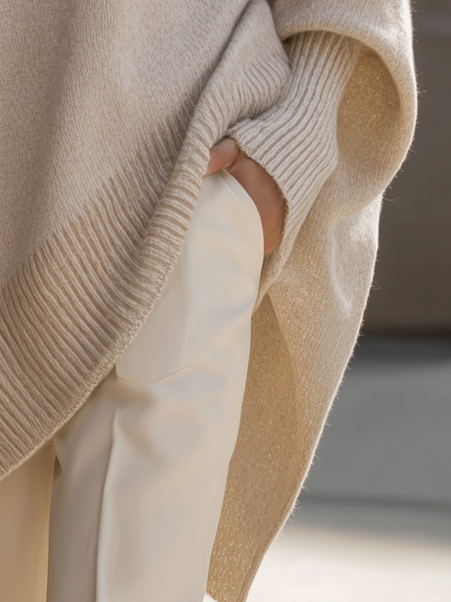 Bea - Poncho-striktrøje i elegant beige