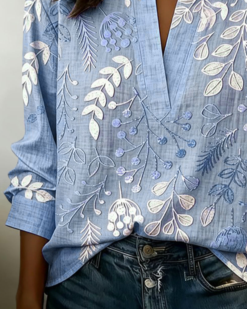 Eleni - Elegant bluse med blomster