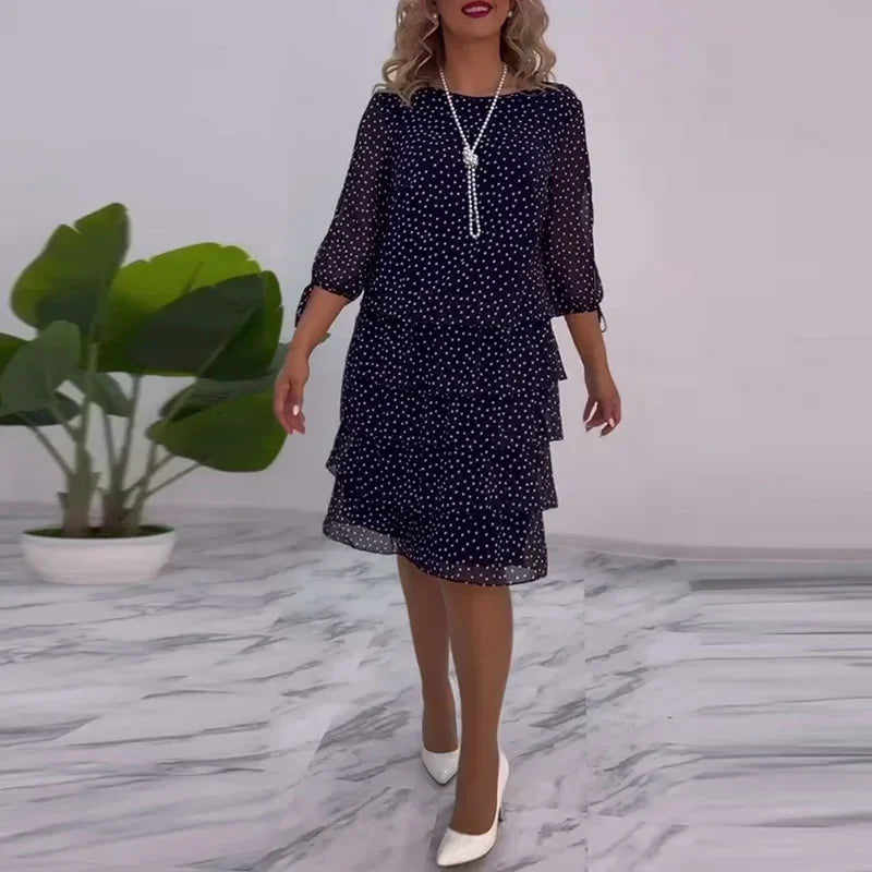 Ella - Elegant midikjole med prikker