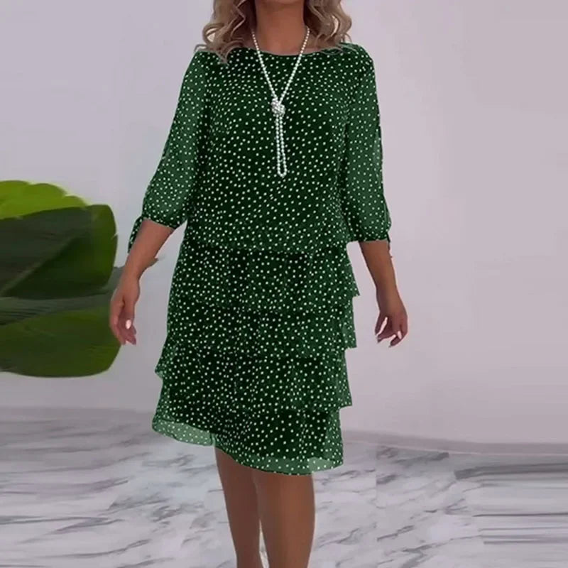 Ella - Elegant midikjole med prikker